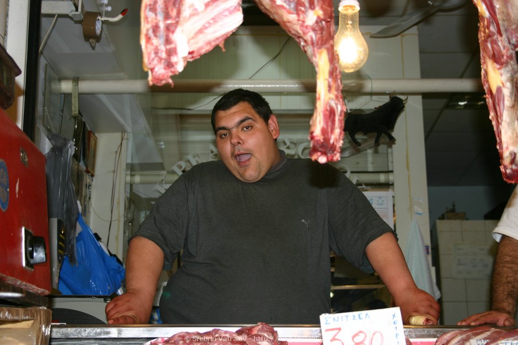 IMG_4024 Meat seller in the open market
Click for next picture...